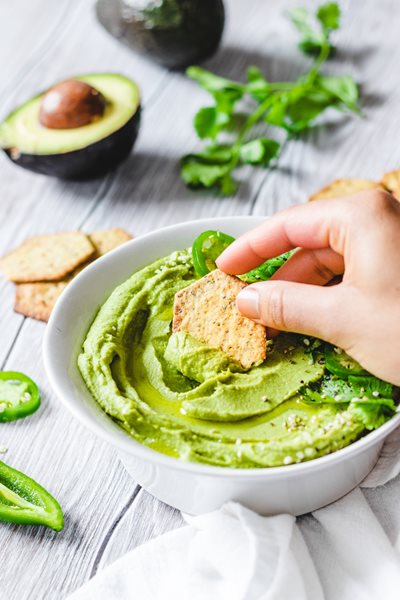 Spicy Avocado Hummus served with Sprouted Seed Crackers Jalapeno