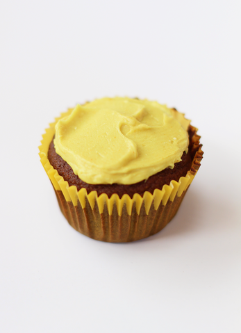 Frosted cupcake with yellow frosting