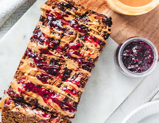 Peanut Butter and Jelly Banana bread on a plate made using Simple Mills Banana Muffin Mix